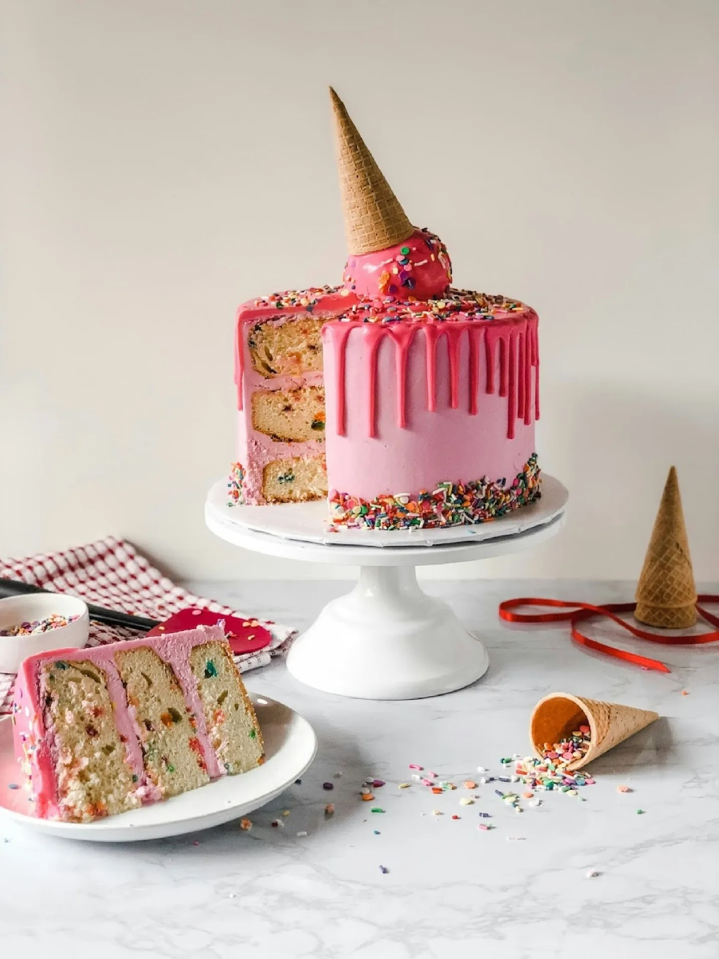 Custom pink drip cake by Triple S Handmade Creations
