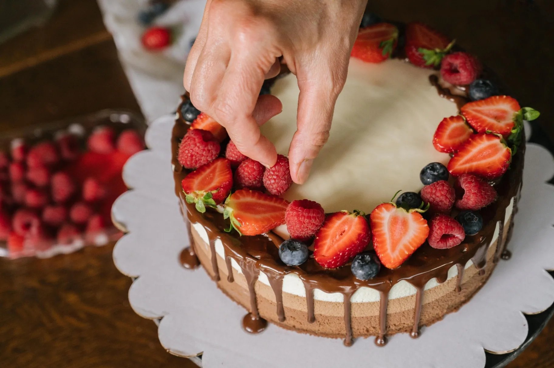 Chocolate drip cake with berries